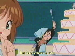 Outra foto: Yamazaki lutando com um bolo na aula de culinária...